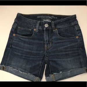 AE dark wash super stretch midi shorts